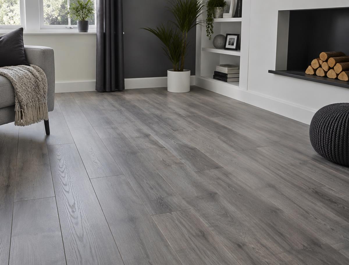 Modern room with grey wood-effect laminate plank flooring across the floor